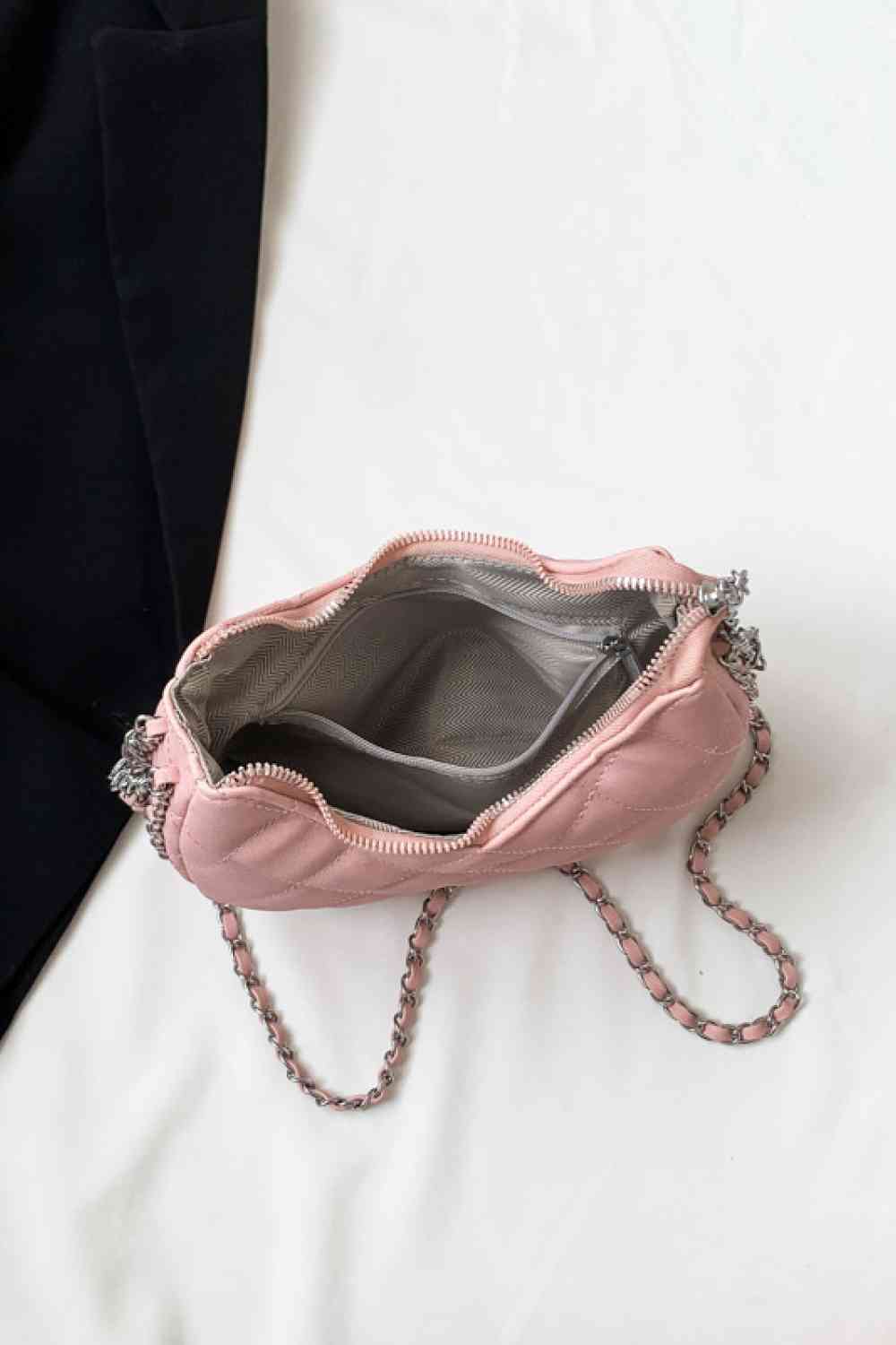 Pink tufted PU leather handbag